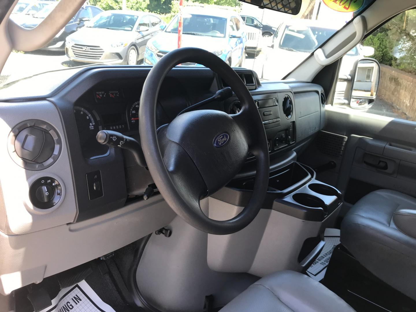 2011 Tan /Gray Ford E-Series Van E250 (1FTNE2EW5BD) with an 4.8 V8 engine, Automatic transmission, located at 577 Chester Pike, Prospect Park, PA, 19076, (610) 237-1015, 39.886154, -75.302338 - 2011 Ford E250 Cargo Van: Ladder racks, shelving, heavy duty partition, power inverter, fully metal body, FLEET MAINTAINED, runs LIKE NEW! This vehicle comes inspected and has been given a bumper to bumper safety check. It is very clean, reliable, and well maintained. We offer a unique pay plan t - Photo#11